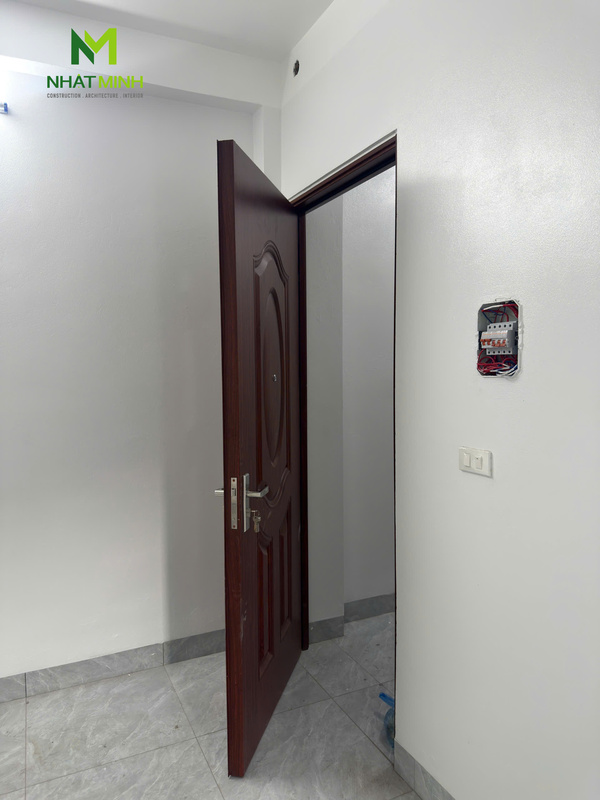 Lắp cửa thép vân gỗ, cửa thép chống cháy chung cư ngõ 89 Lê Đức Thọ