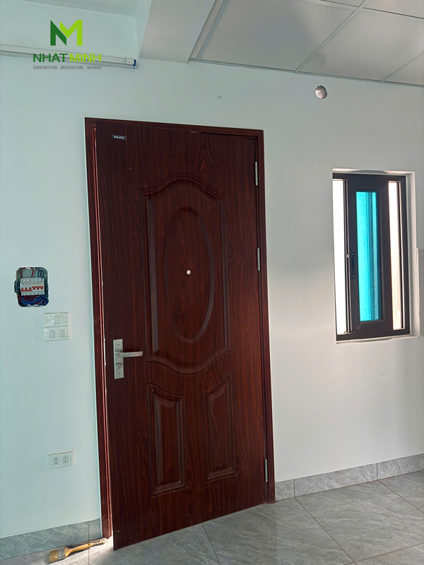 Lắp cửa thép vân gỗ, cửa thép chống cháy chung cư ngõ 89 Lê Đức Thọ