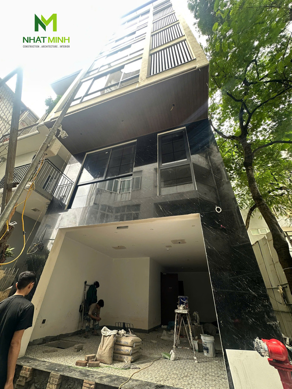 Lắp cửa thép vân gỗ 4 cánh Galaxy cho nhà phố ngõ 149 Lê Duẩn, Hà Nội