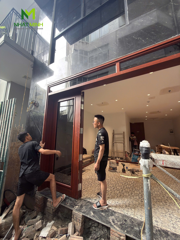 Lắp cửa thép vân gỗ 4 cánh Galaxy cho nhà phố ngõ 149 Lê Duẩn, Hà Nội